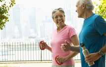 Older adults smiling and working out